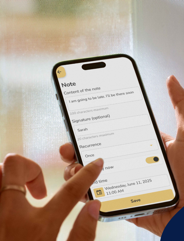 Person holding a smartphone with the Idem app open on a blurred background