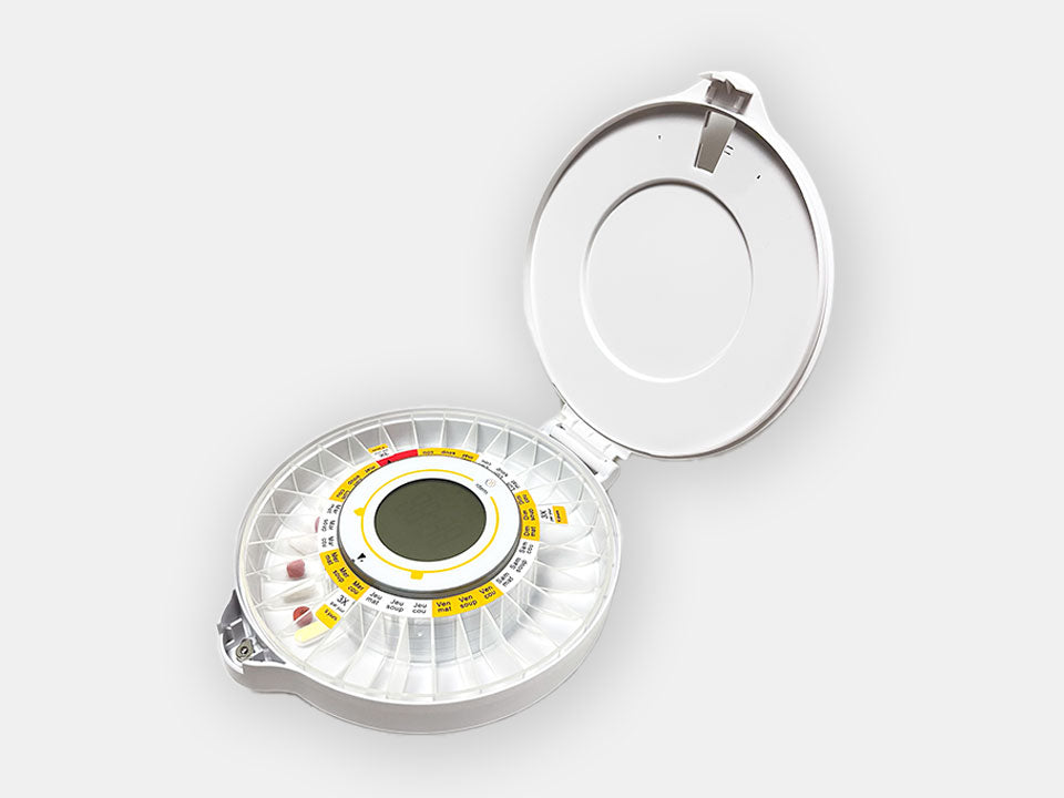 The Idem Smart Pill Dispenser opened