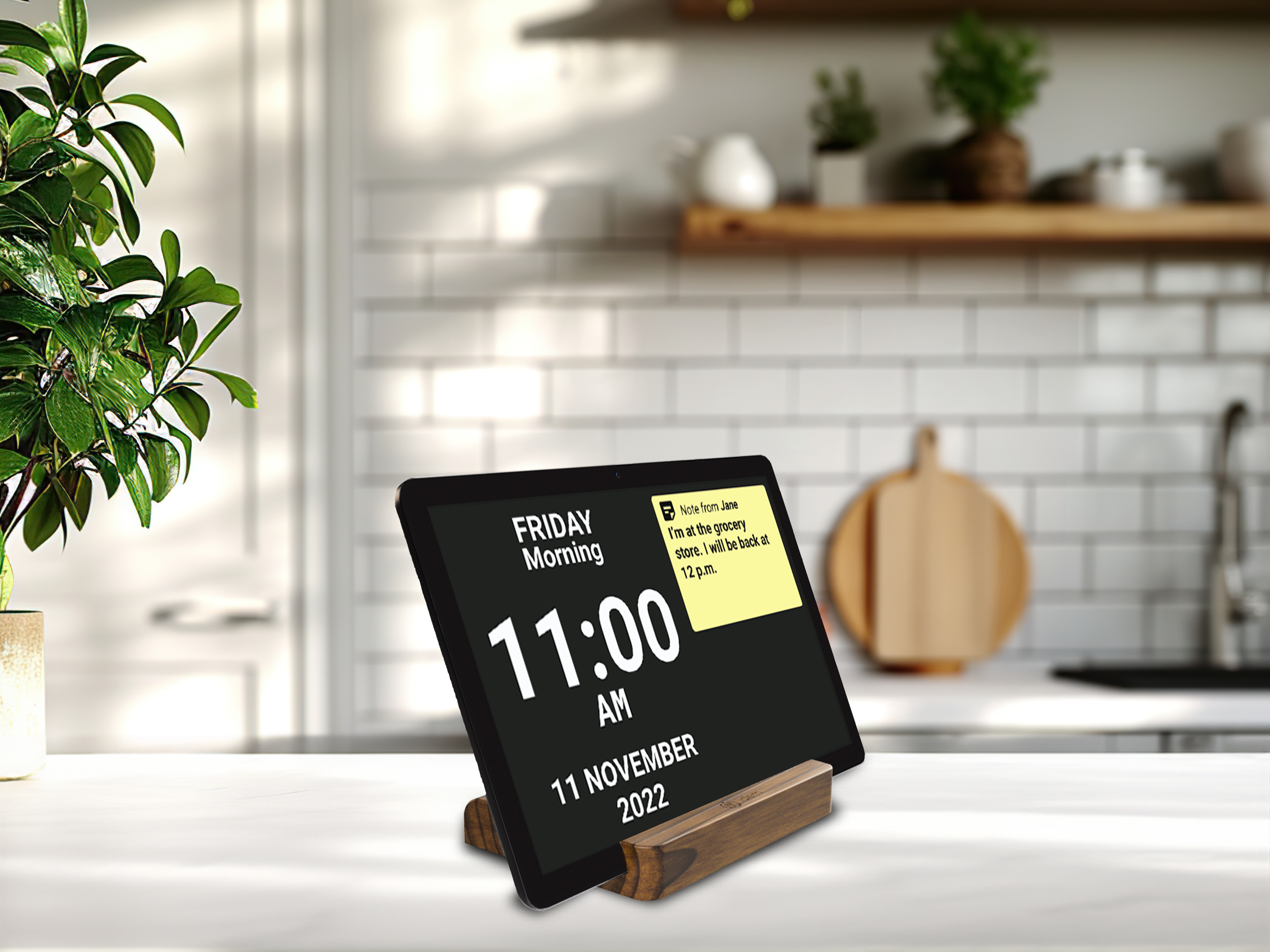 An idem clock on a kitchen counter in a house